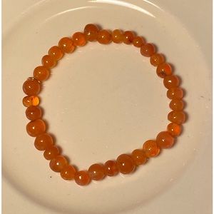 Unisex rare natural orange agate stretch elastic bracelet.